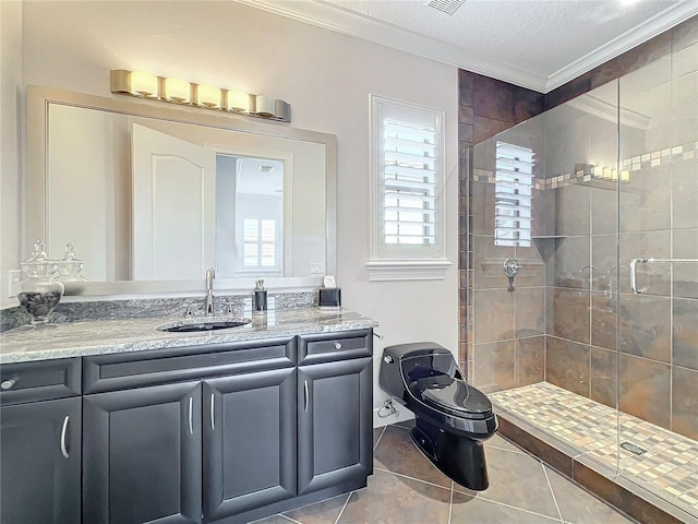 bathroom featuring vanity, ornamental molding, a textured ceiling, a shower with shower door, and tile patterned floors