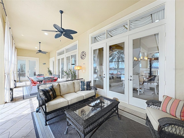 view of patio / terrace with an outdoor hangout area, ceiling fan, and french doors