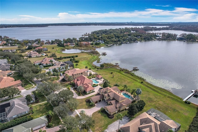 birds eye view of property featuring a water view