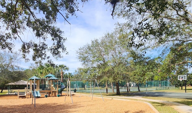 view of playground with basketball court