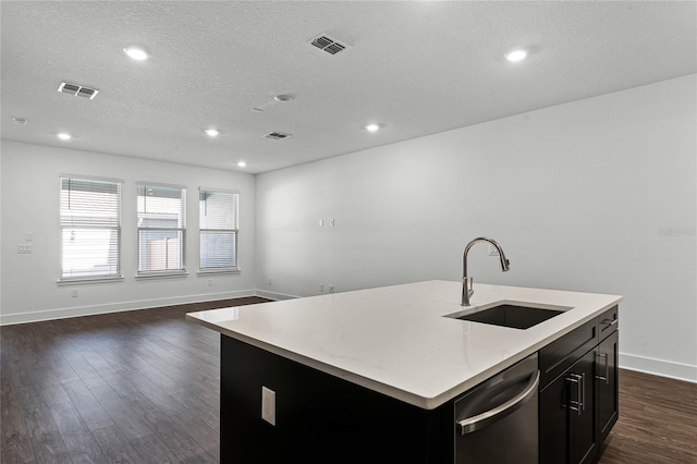 kitchen featuring dishwashing machine, visible vents, dark wood finished floors, a sink, and open floor plan