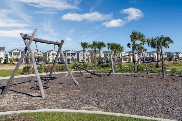 community jungle gym with a residential view