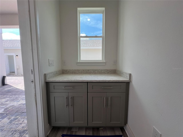 bathroom featuring vanity and wood finished floors