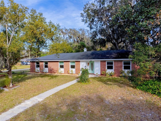 ranch-style house with a front yard