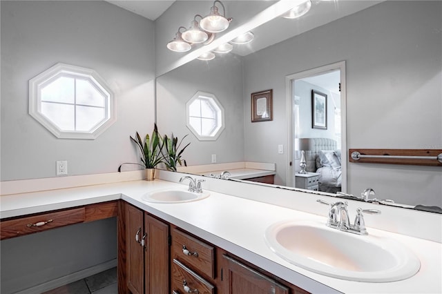 bathroom with vanity and tile patterned floors