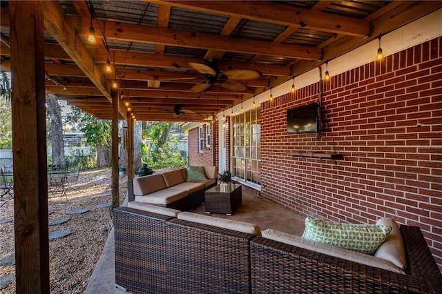 view of patio with ceiling fan and outdoor lounge area