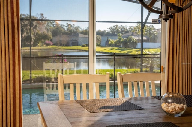 sunroom with a water view