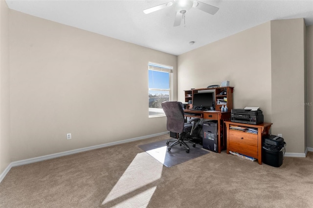 home office with ceiling fan and carpet floors