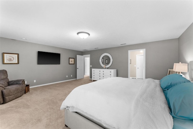 bedroom featuring light colored carpet