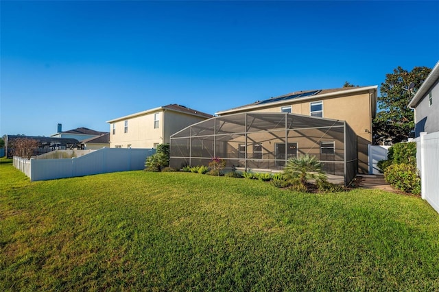 view of yard with a lanai