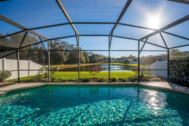 view of pool featuring a water view and a lanai