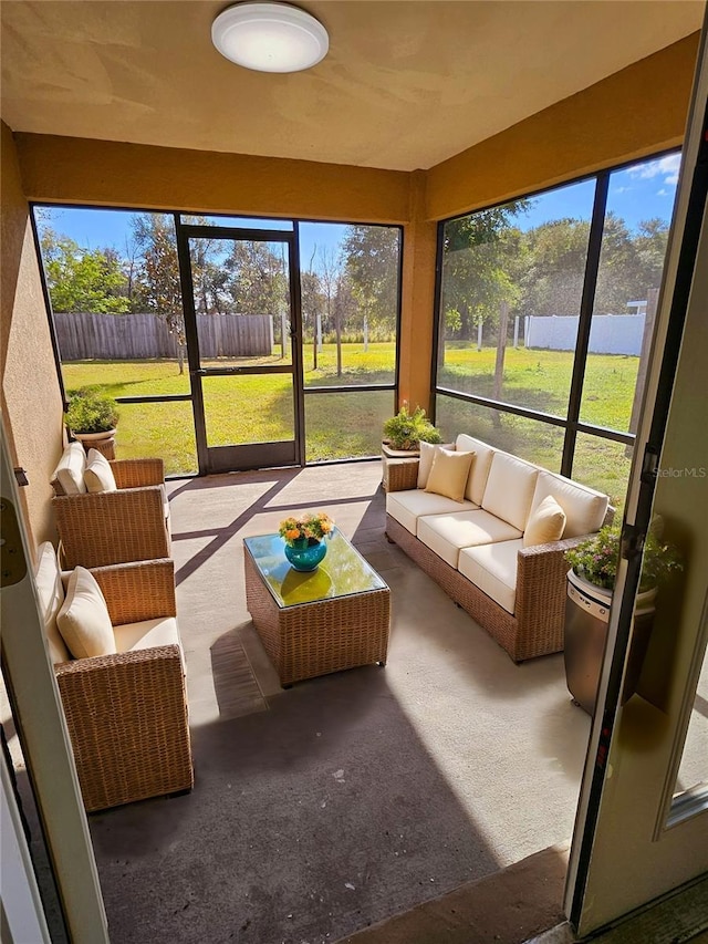 sunroom / solarium with a wealth of natural light