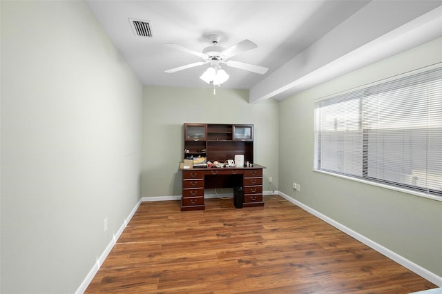 office space with ceiling fan and dark hardwood / wood-style floors