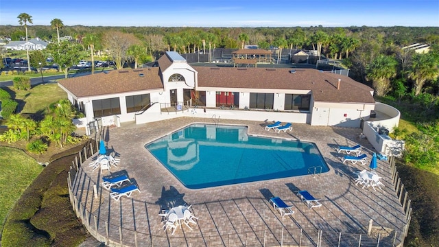 view of swimming pool featuring a patio area