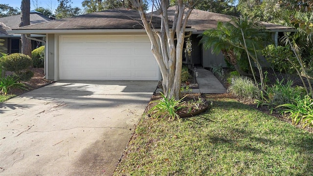 ranch-style home featuring a garage