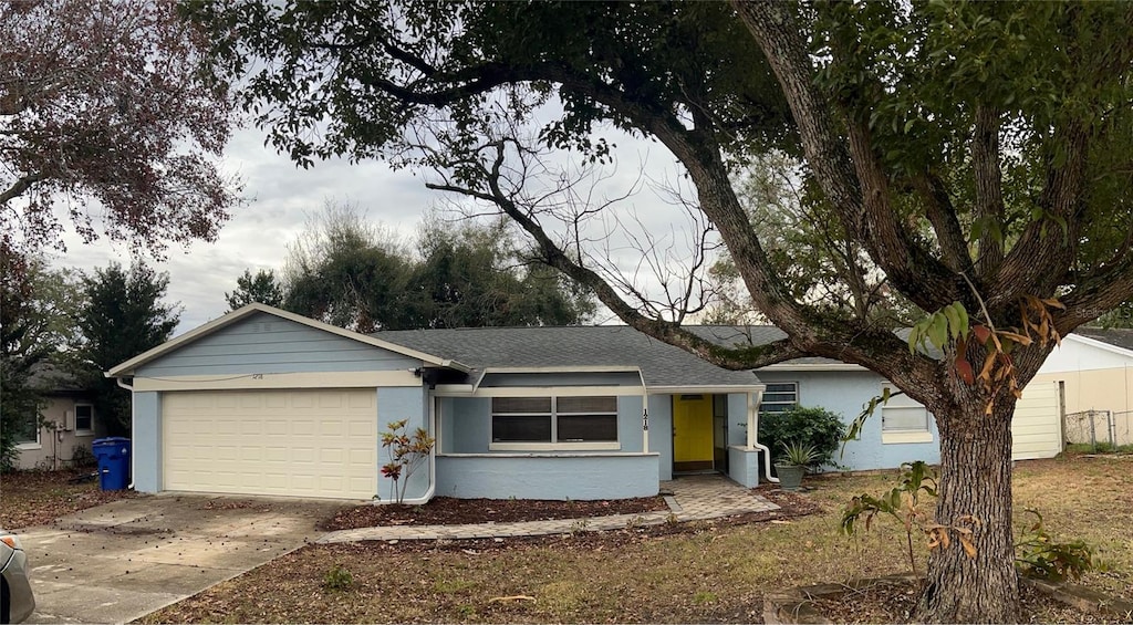 ranch-style house with a garage