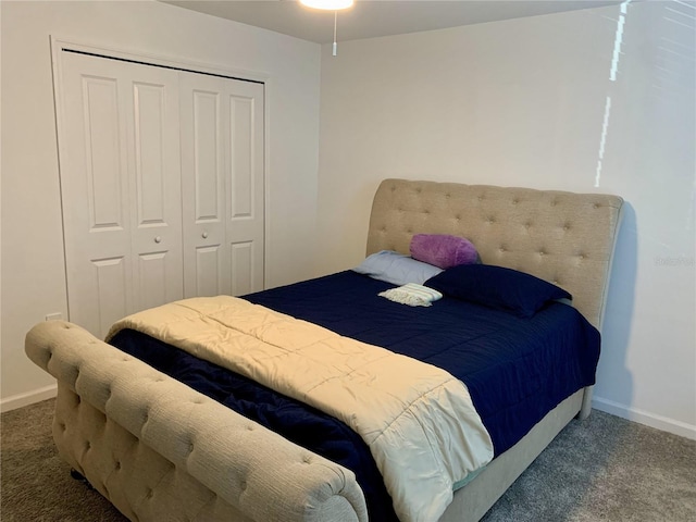 bedroom featuring a closet and carpet