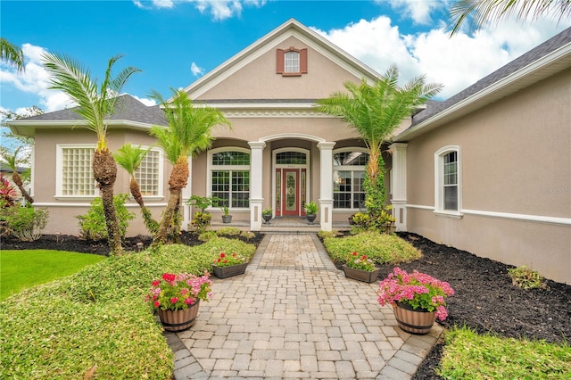 entrance to property featuring covered porch