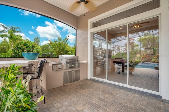 exterior space featuring ceiling fan