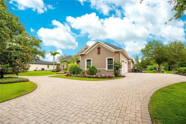 view of front facade with a front lawn