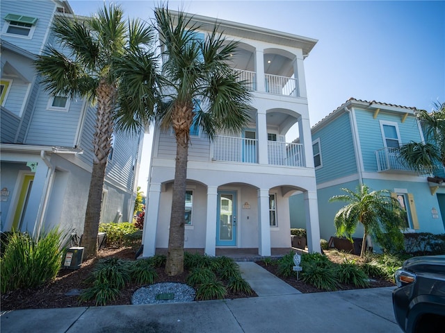 view of front of home with a balcony