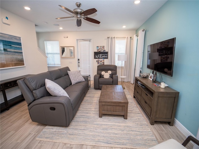 living room featuring ceiling fan