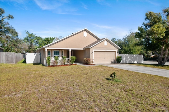 ranch-style home featuring a garage and a front lawn