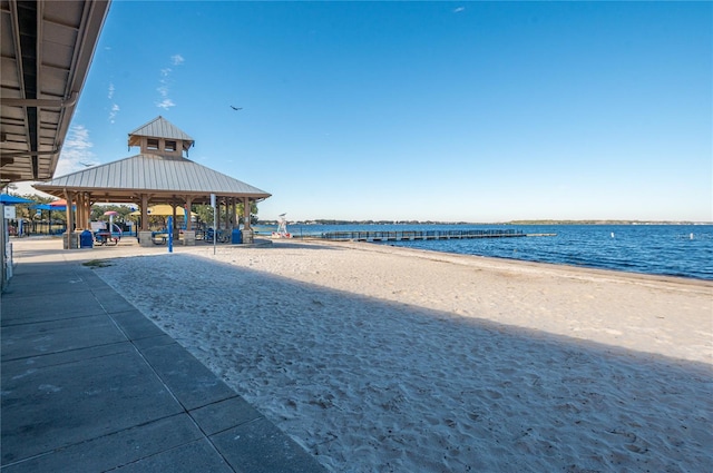 view of water feature with a gazebo and a view of the beach