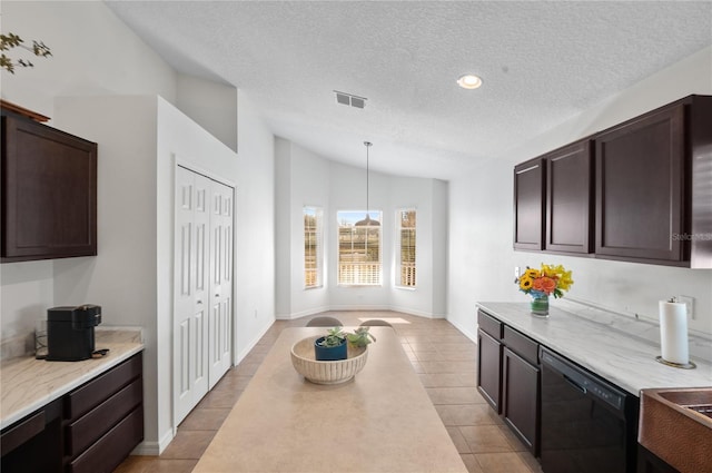 kitchen with pendant lighting, light tile patterned floors, lofted ceiling, dishwasher, and dark brown cabinets