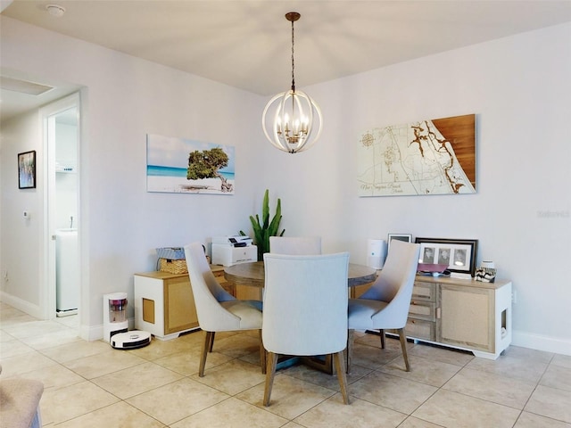 tiled dining area with a notable chandelier