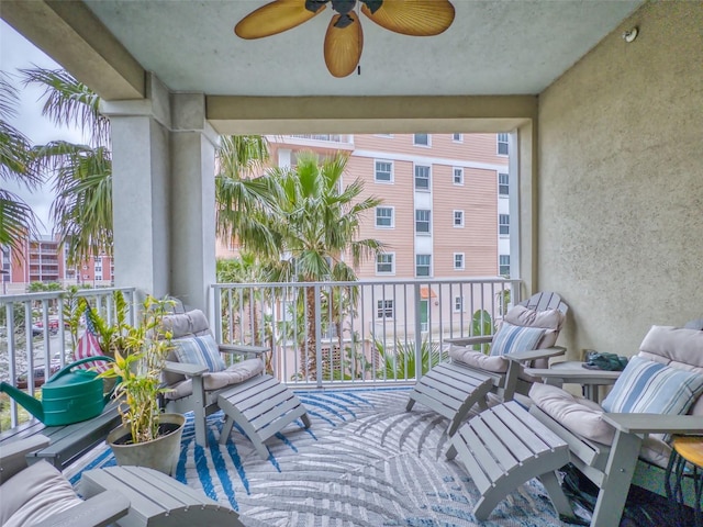 balcony featuring ceiling fan