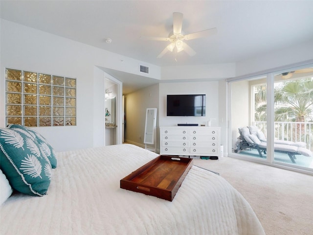 carpeted bedroom featuring access to outside and ceiling fan