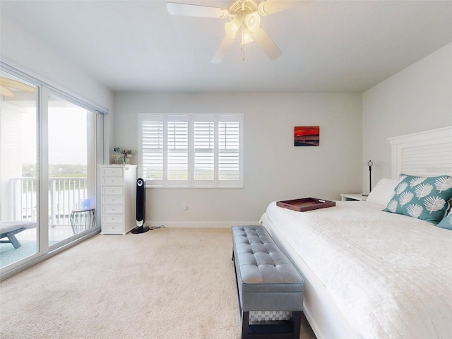 carpeted bedroom with access to outside and ceiling fan