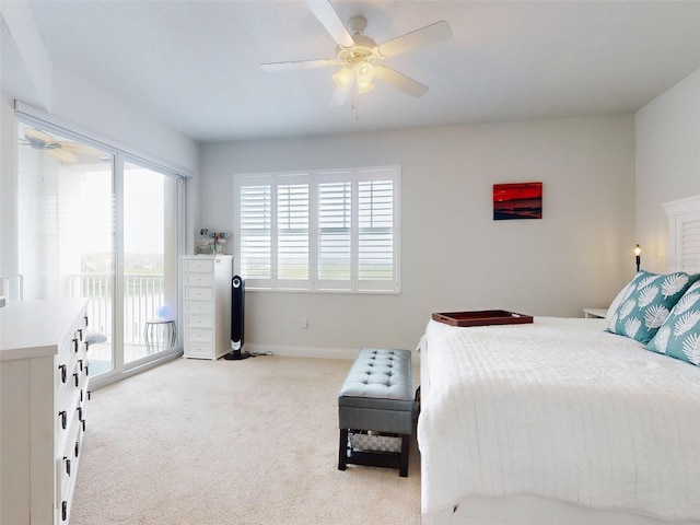 bedroom with ceiling fan, light colored carpet, and access to exterior