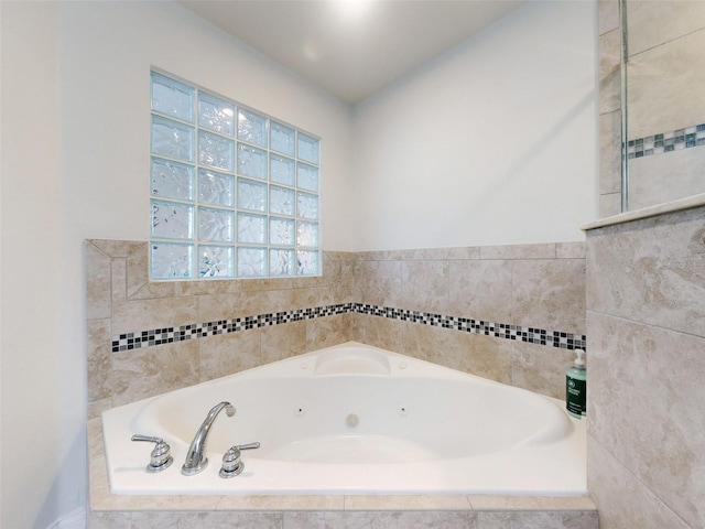 bathroom featuring tiled bath