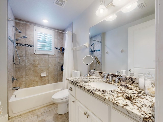 full bathroom with shower / bath combination with curtain, tile patterned floors, toilet, and vanity