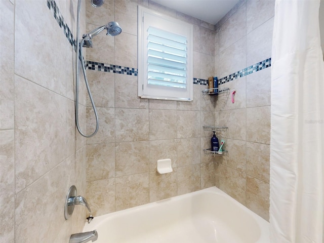 bathroom featuring shower / bath combination with curtain