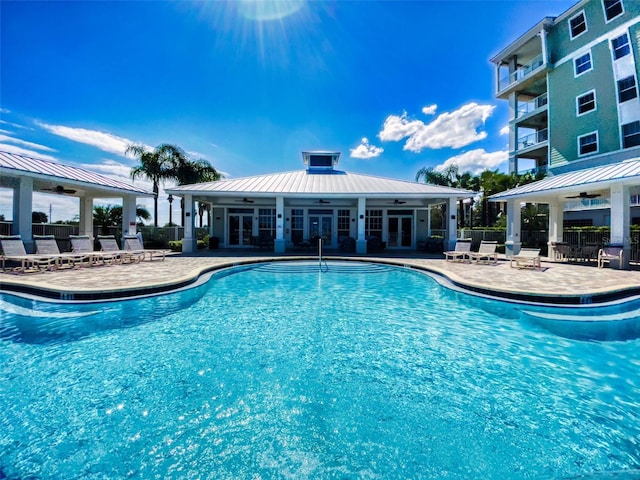 view of pool featuring a gazebo, a patio, and ceiling fan