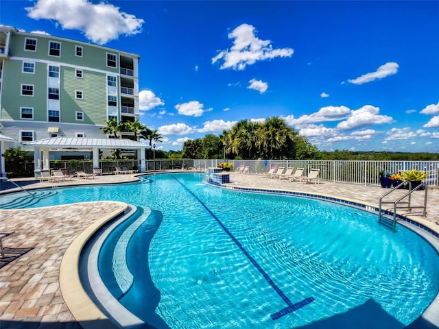 view of pool featuring a gazebo and a patio area