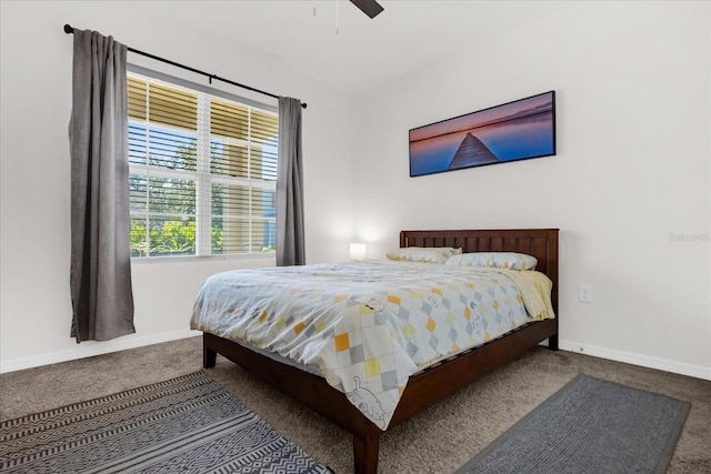 bedroom featuring ceiling fan and carpet flooring