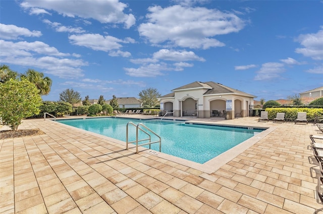 view of swimming pool featuring a patio