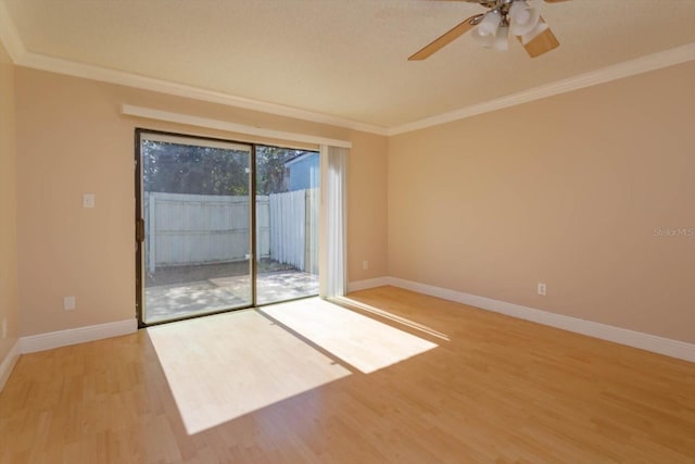 unfurnished room featuring crown molding, ceiling fan, and light wood-type flooring