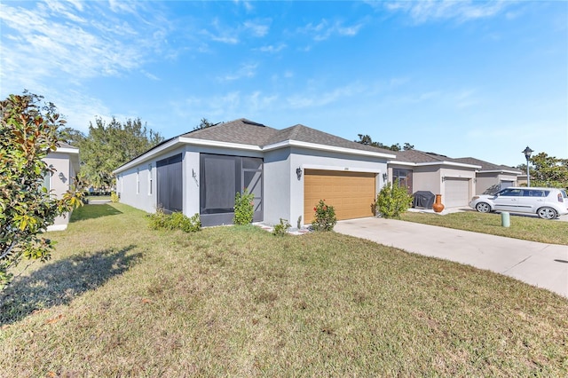 view of front of house featuring a garage and a front yard