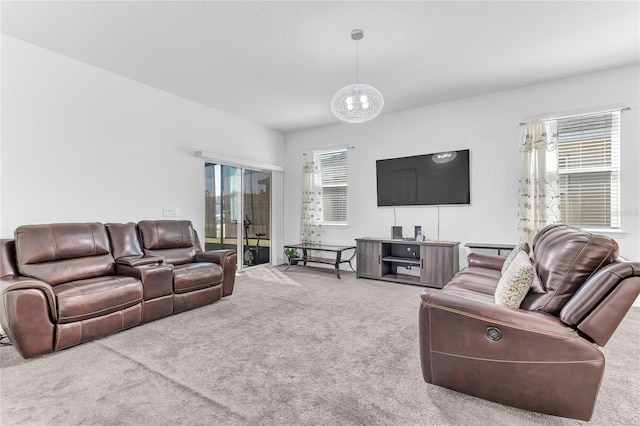 carpeted living room with plenty of natural light