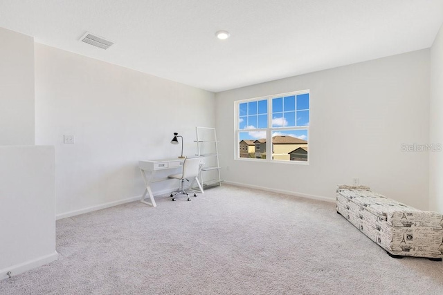 interior space featuring light colored carpet