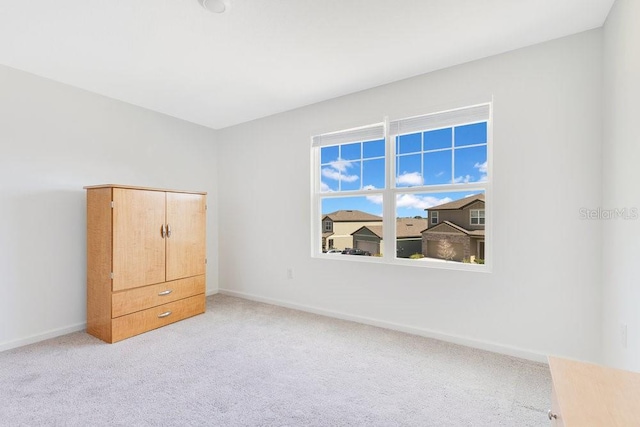 unfurnished bedroom with carpet