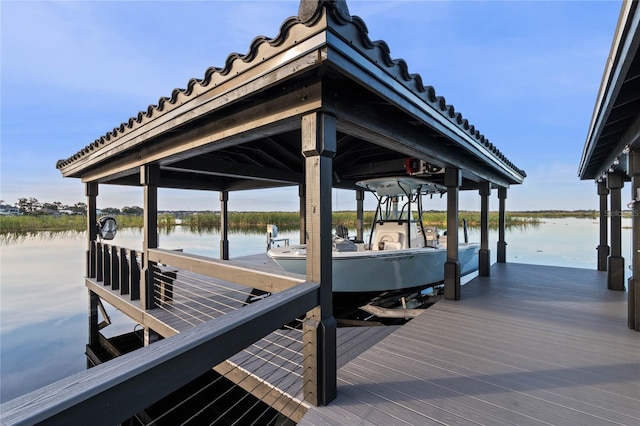 dock area featuring a water view