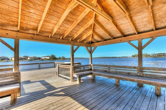 view of dock featuring a gazebo and a water view