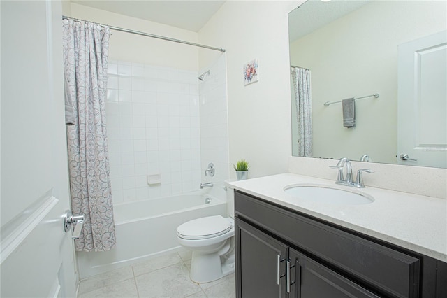 full bathroom with shower / tub combo, vanity, tile patterned flooring, and toilet