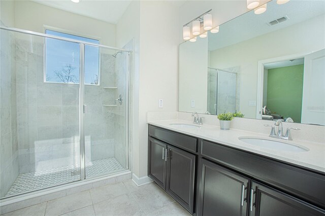 4708 Tribute Trl, Kissimmee, FL 34746 - ensuite bathroom with visible vents, a shower stall, and a sink